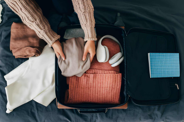 person packing for holiday