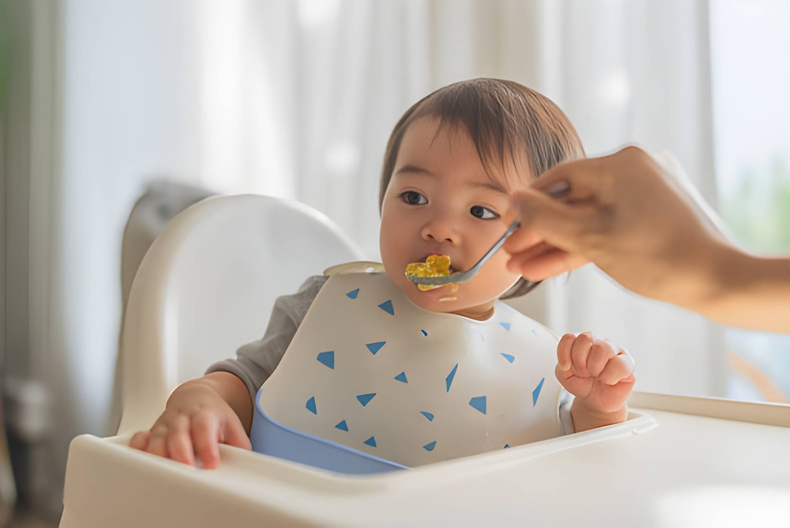 a baby getting fed
